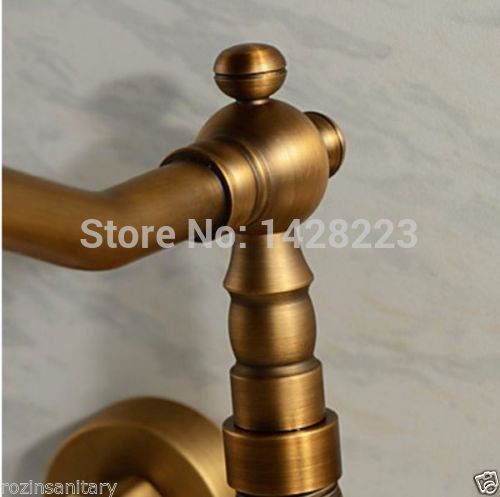 good quality wall mounted dual handle kitchen sink faucet antique brass and cold water swivel spout mixer tap - Click Image to Close