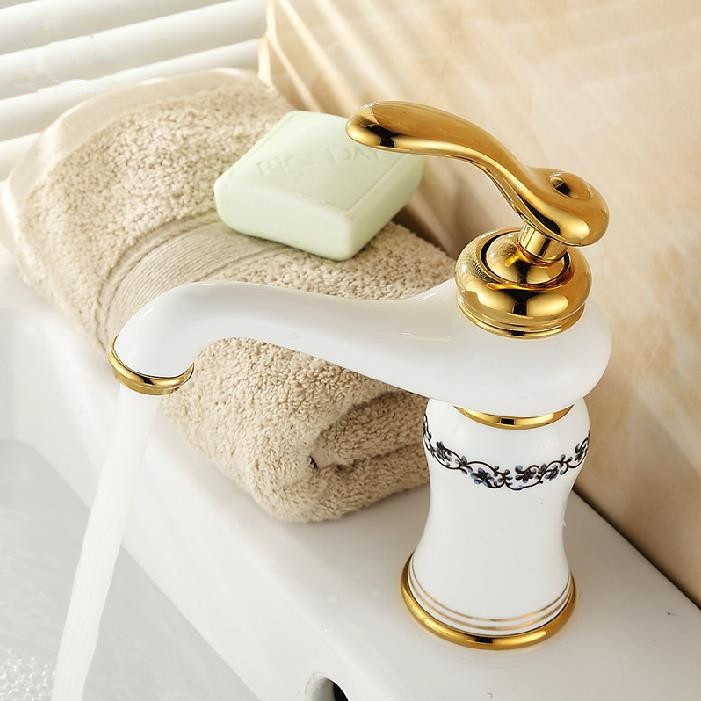 whole and retail promotion golden brass bathroom basin faucet vanity sink white mixer tap single handle qx9004